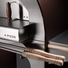 The ALFA 4 PIZZE outdoor pizza oven with optional sleek stainless steel bottom cart holds all your pizza making accessories easily