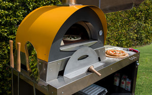 Stainless steel multi-functional base cart for your Great Outdoor Pizza Oven with plenty of space for food preparation